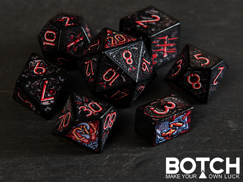 Graphics are monster themed on a black color base dice with red text. 